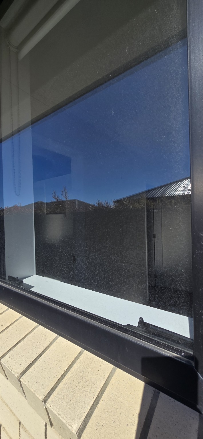 Dirty window before professional cleaning